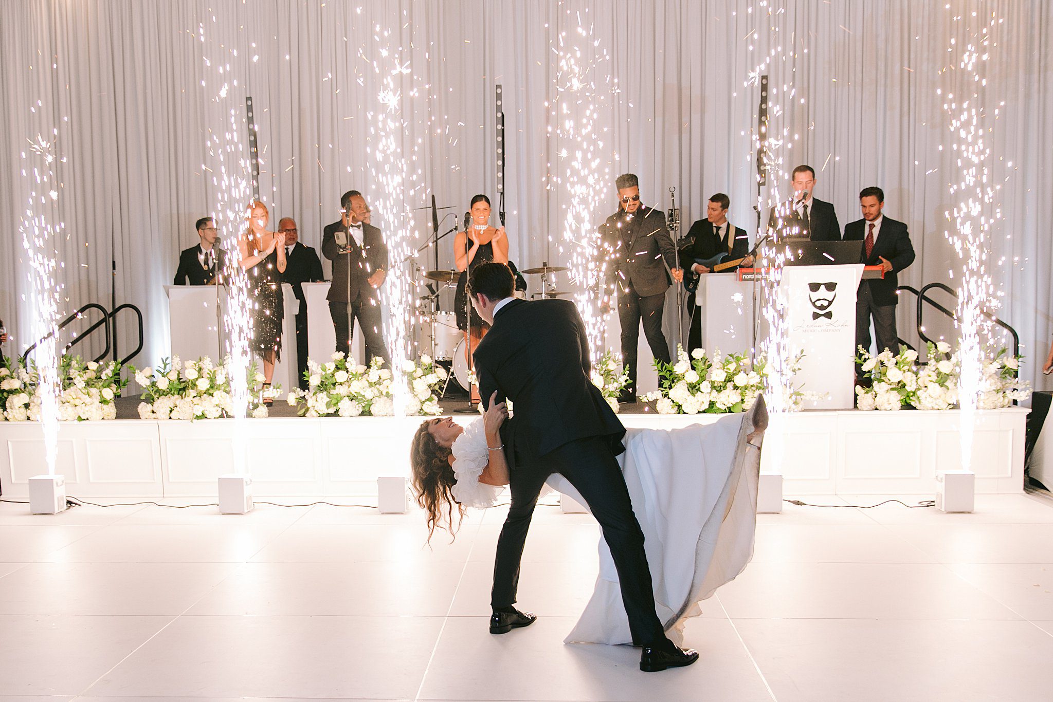 bride and groom first dance sparklers wedding reception in the Vanderbilt ballroom at The Ritz-Carlton Naples Florida