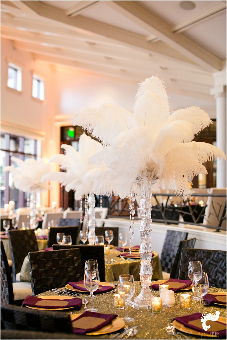 wedding centerpiece with white feathers